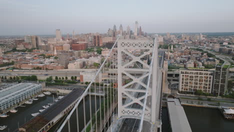 aerial view of philadelphia and the ben franklin bridge. shot at sunrise on a summer morning