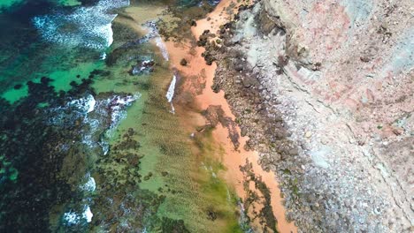 aerial-view-of-tropical-beach,-blue-waves,-4k