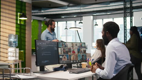 tech startup office team collaborating via videocall, doing brainstorming