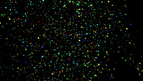 confeti colorido sobre un fondo negro