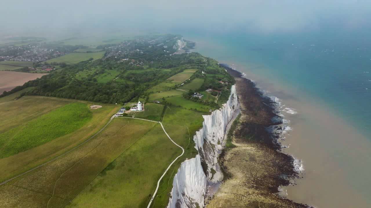 White Cliffs of Dover, Coastline And South Foreland Lighthouse In Kent, England, UK. - aerial shot