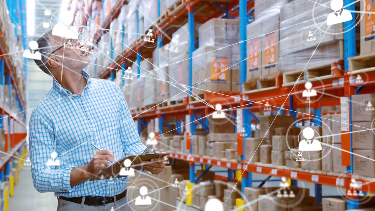 Warehouse lead checking clipboard while network icon expanding through racks for inventory check