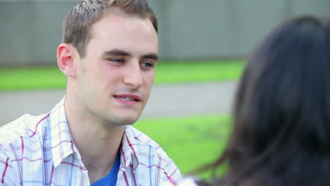 Students-having-a-chat-on-the-lawn