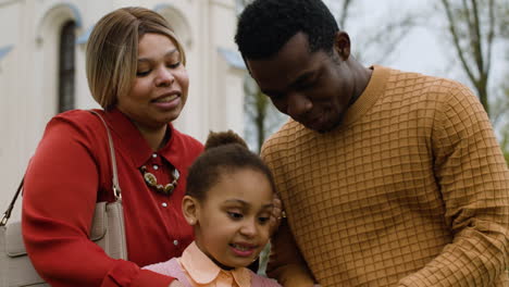 Family-outside-the-church