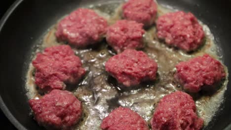 cook meatballs in frying pan