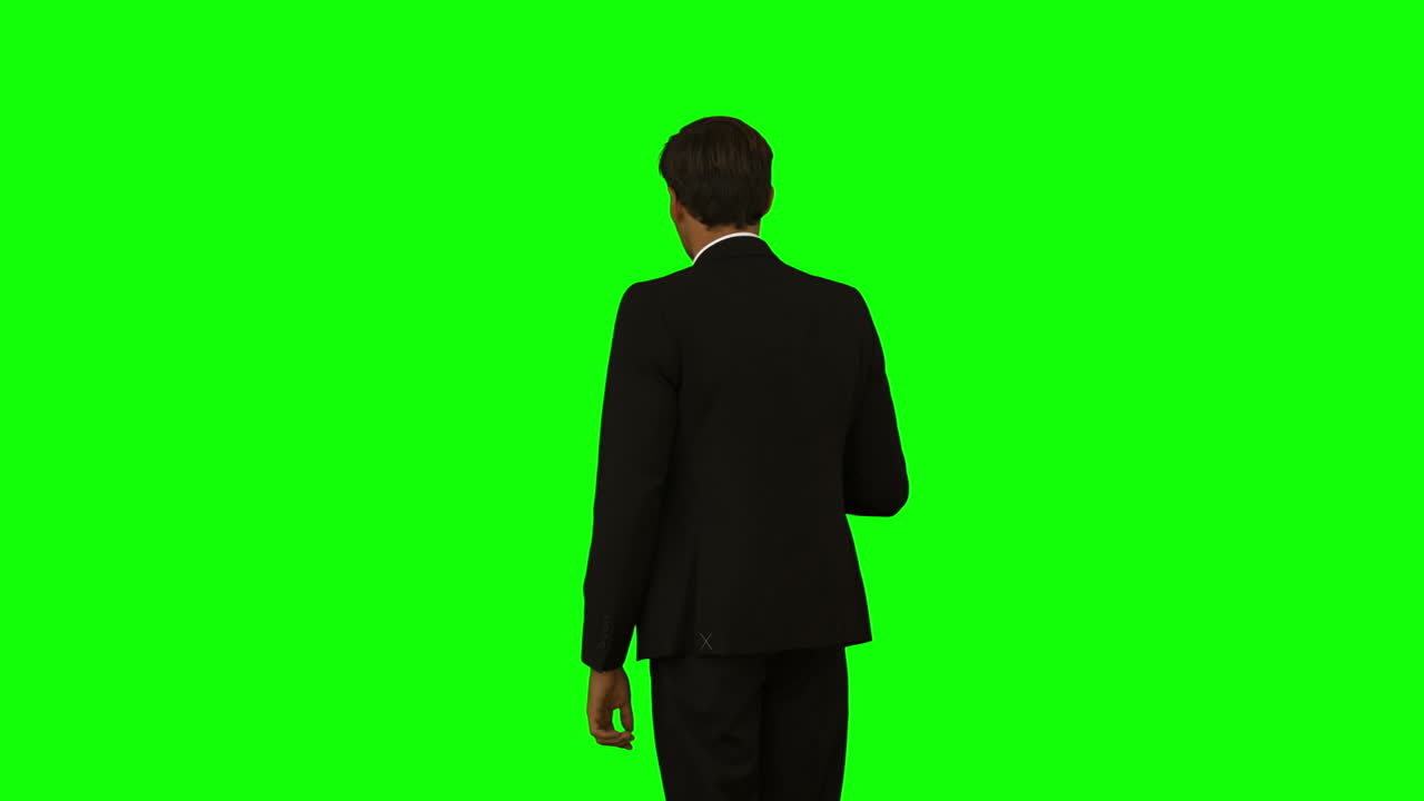 손가락 으로 가리키는 사업가 의 뒷면