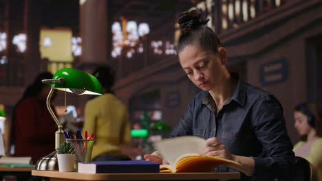 woman studying in a library