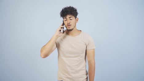 Man-getting-bad-news-on-the-phone-gets-upset.