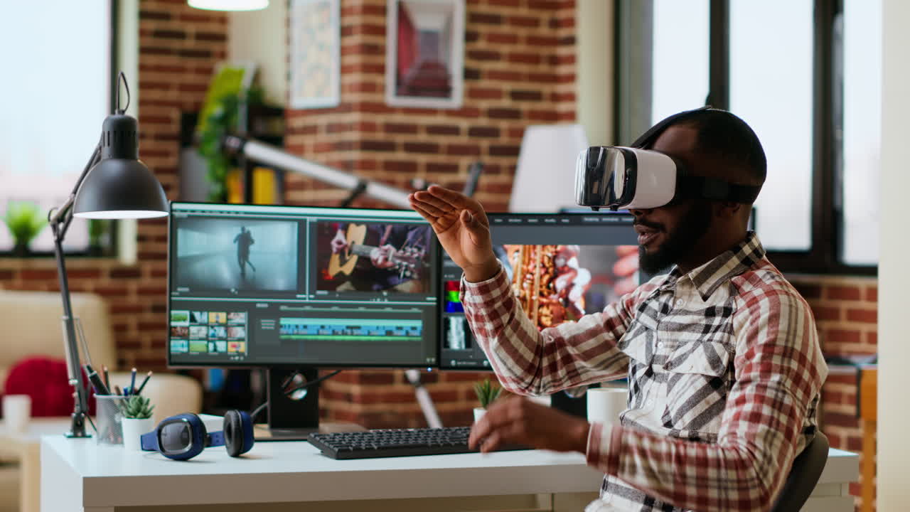 African american editor uses virtual reality glasses to do color grading