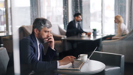 businessman working in a coffee shop