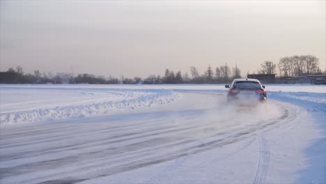 car driving on a frozen track in winter