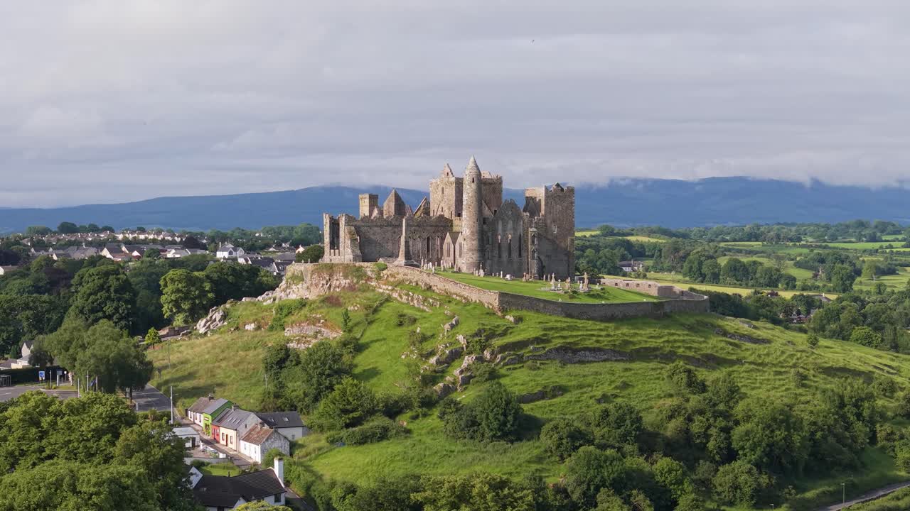 Majestic Rock of Cashel in Ireland, historic site on a green hill