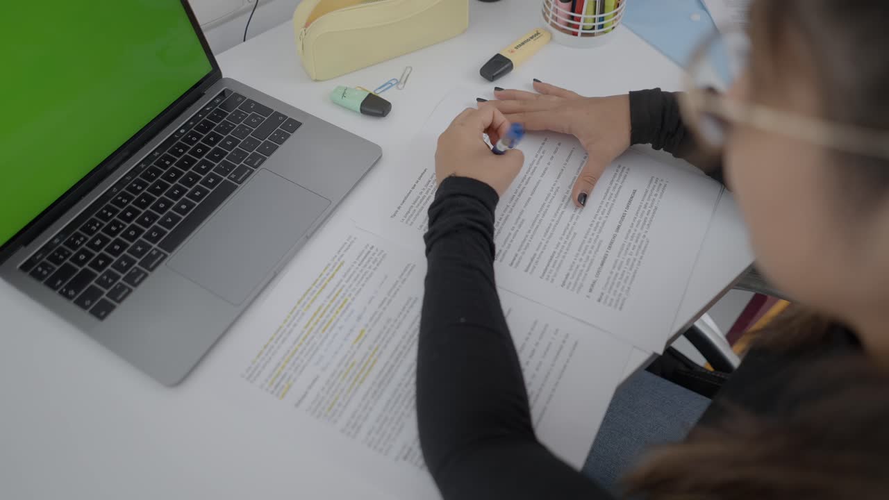 Woman studying and working on a laptop