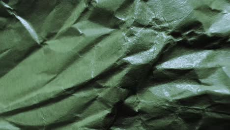 crumpled dark green texture background