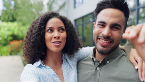 Face,-keys-and-couple-with-real-estate