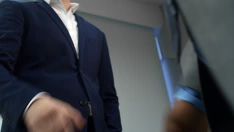 diverse business partners greeting each other with handshake