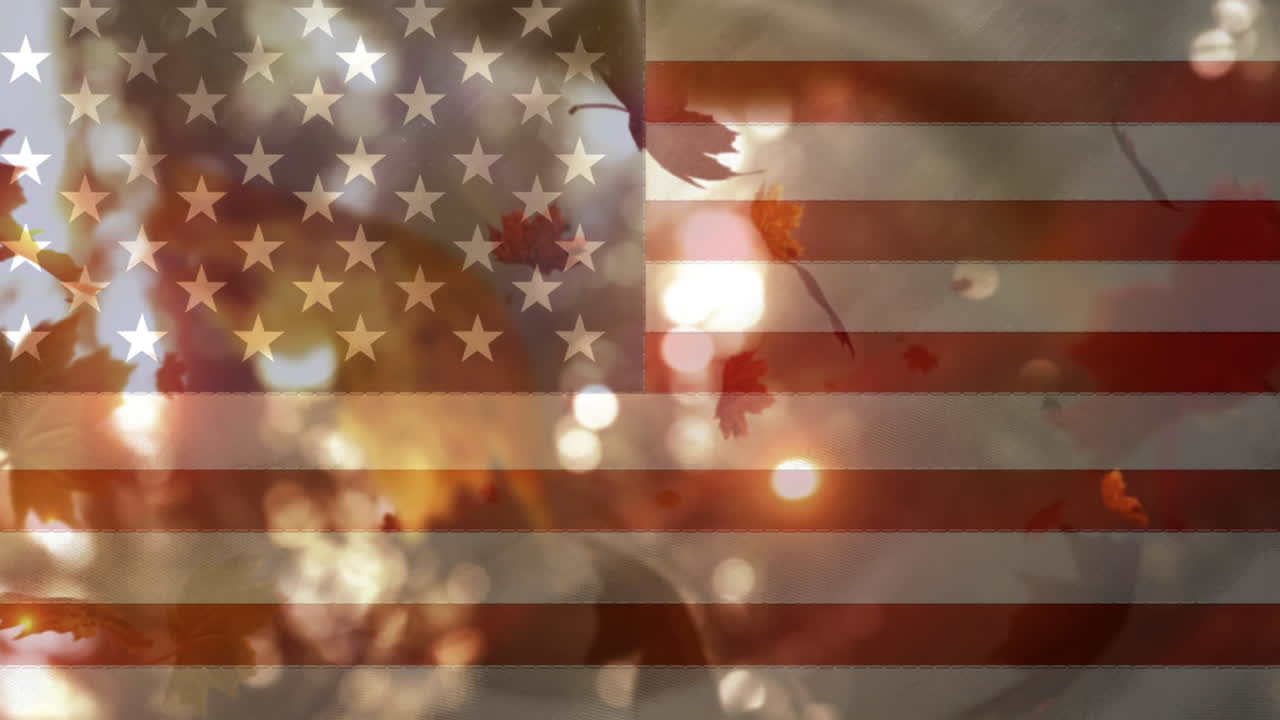 bandera estadounidense y hojas caen