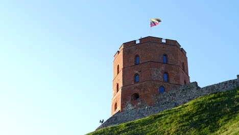 lithuanian flag flying above gediminas castle tower, vilnius, lithuania fort