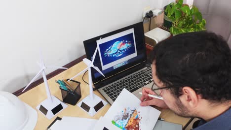 artist drawing an environmental illustration for a climate project