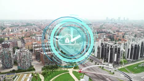 animation of clock over padlock in cloud and aerial view of modern city against sky