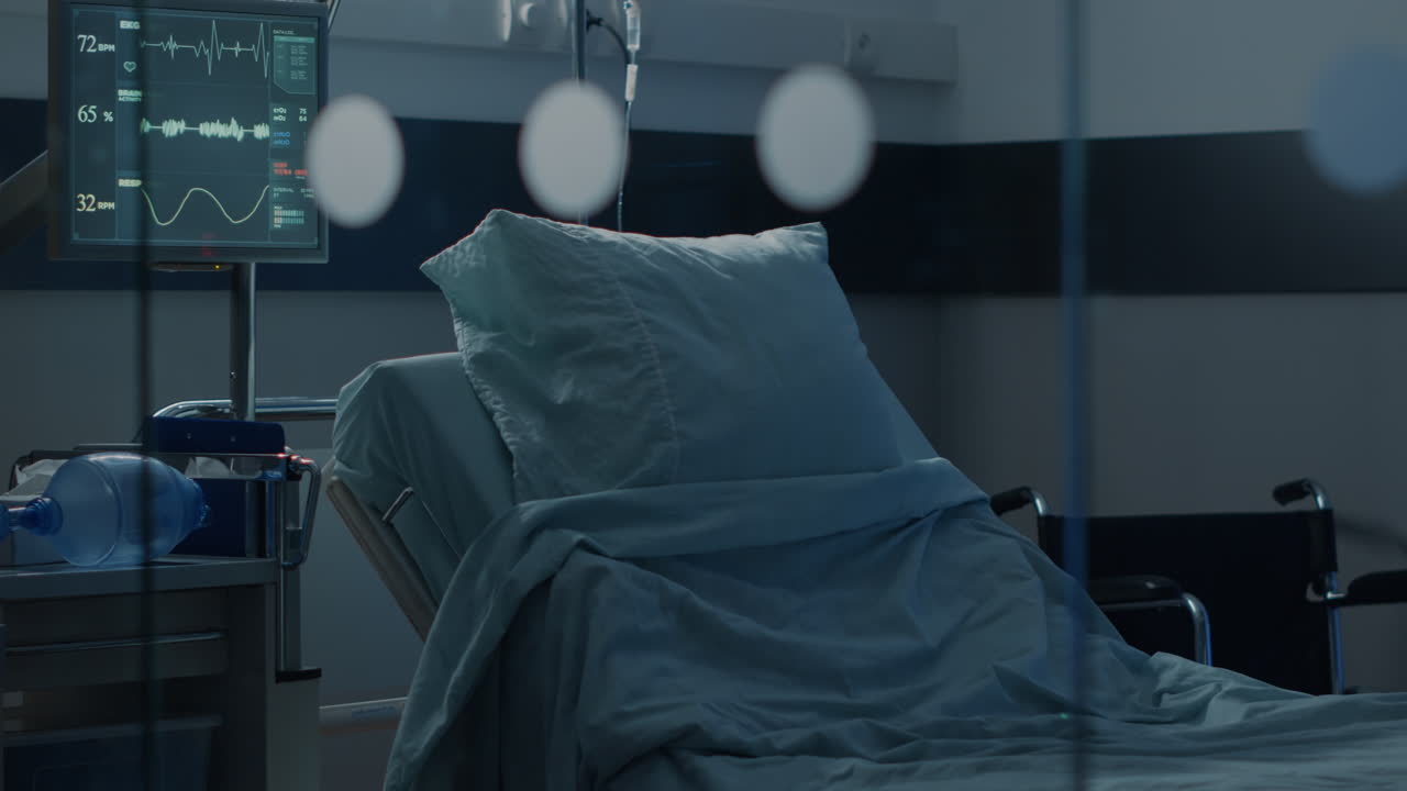 Empty bed in hospital ward designed for emergency