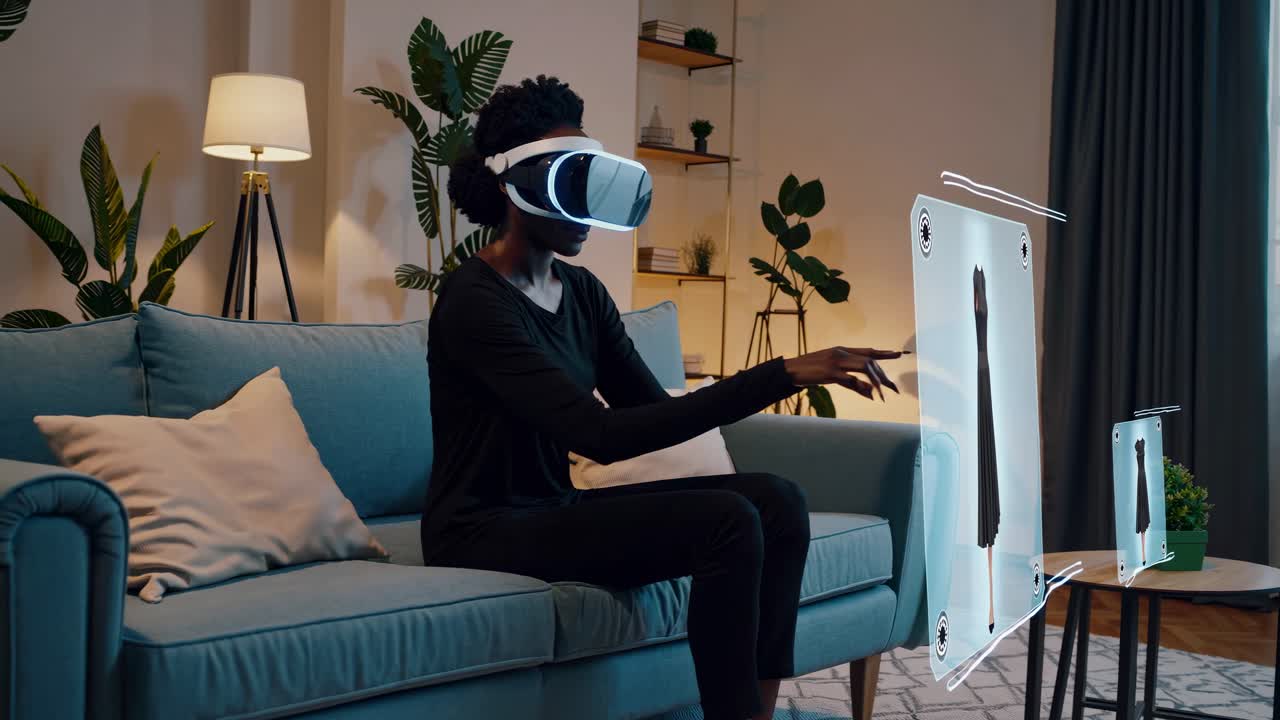 Woman using VR headset to virtually try on a dress at home