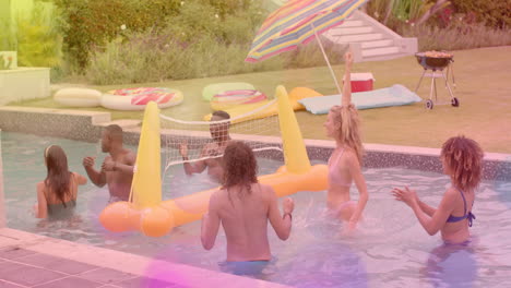 playing volleyball in pool, friends enjoying summer party together