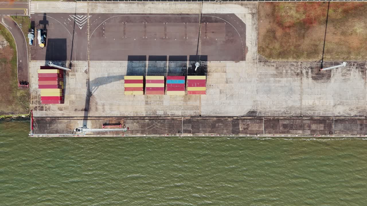 Aerial top-down image of the small river port of the city of Posadas, Misiones, Argentina, located on the famous Paraná River