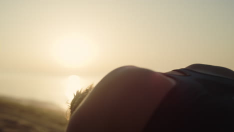 silhouette girl making yoga asana att sunset light. woman standing marjariasana.
