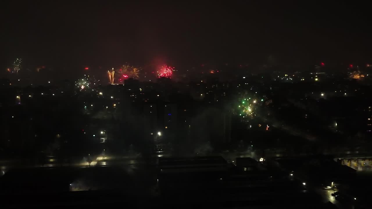 Spectacular pyrotechnics show over European city at night. Aerial