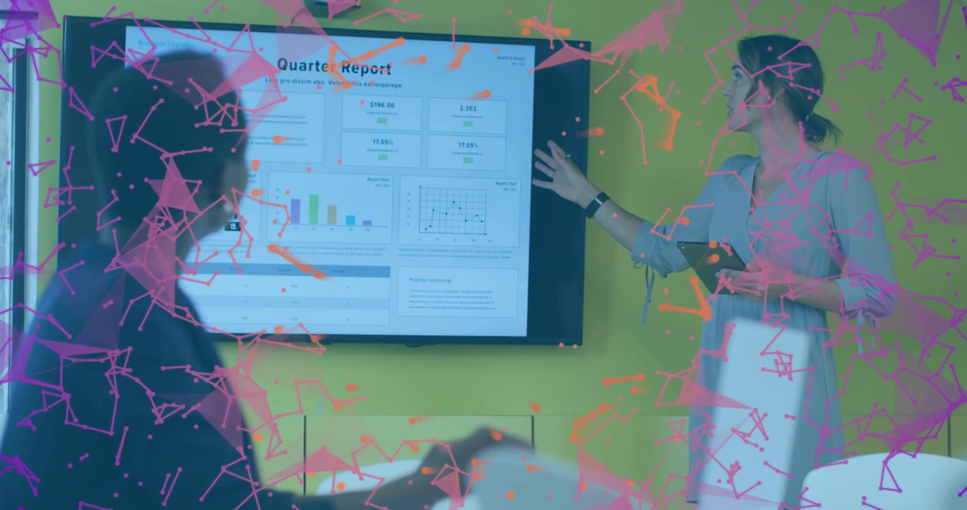Presenter tapping monitor, pointing charts, reviewing quarter report with pink overlay over charts