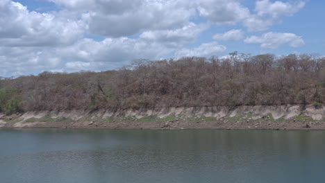 Slow-motion-panning-shot-of-drought-at-Lake-Alajuela-affecting-the-Panama-Canal