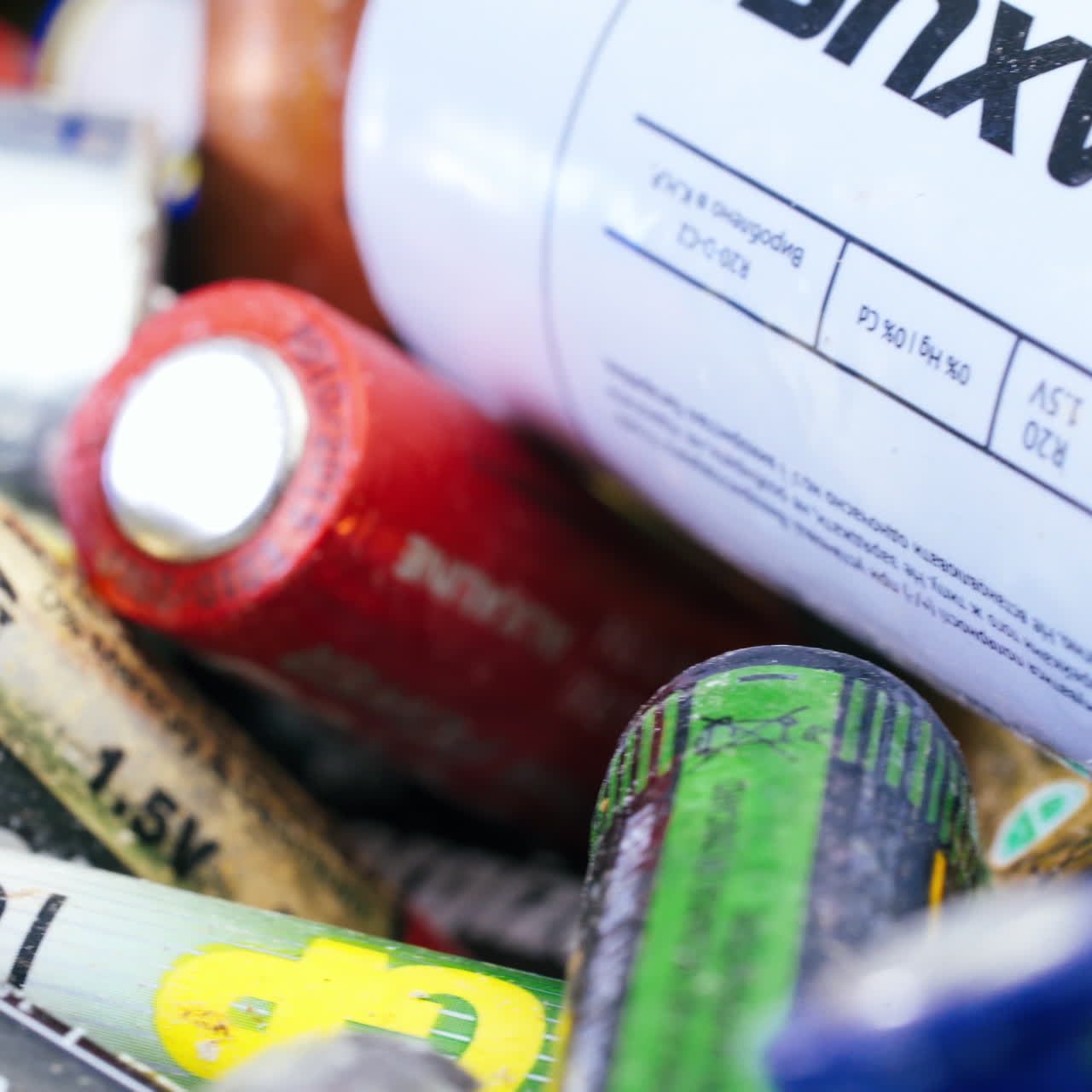 collecting used batteries at the recycling station