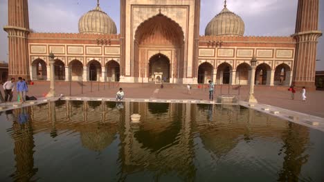 reflection of jama masjid in a pool