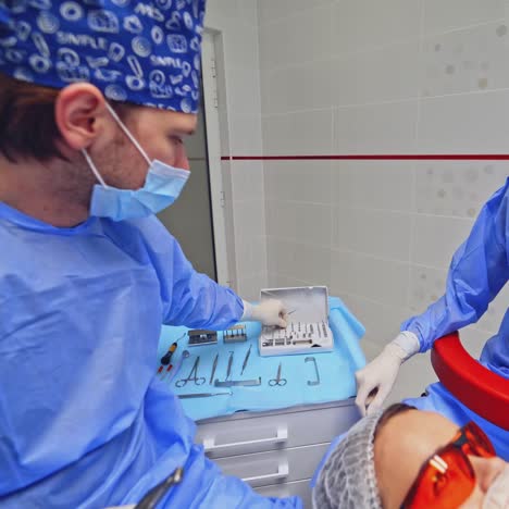 dentist performing dental surgery