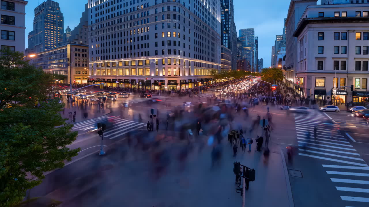 Busy City Street Intersection at Dusk with Motion Blurred People and Traffic