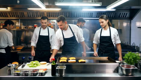 chefs preparing burgers in a professional kitchen