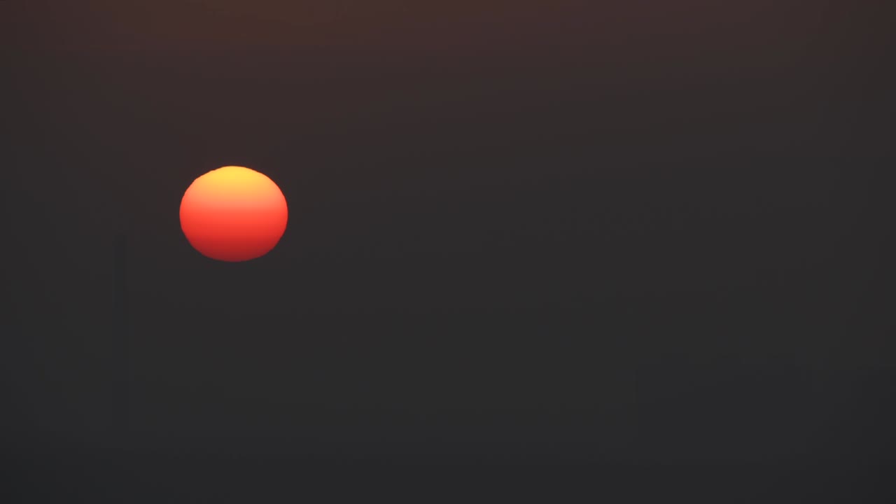 The beautiful sunset in the dark sky
