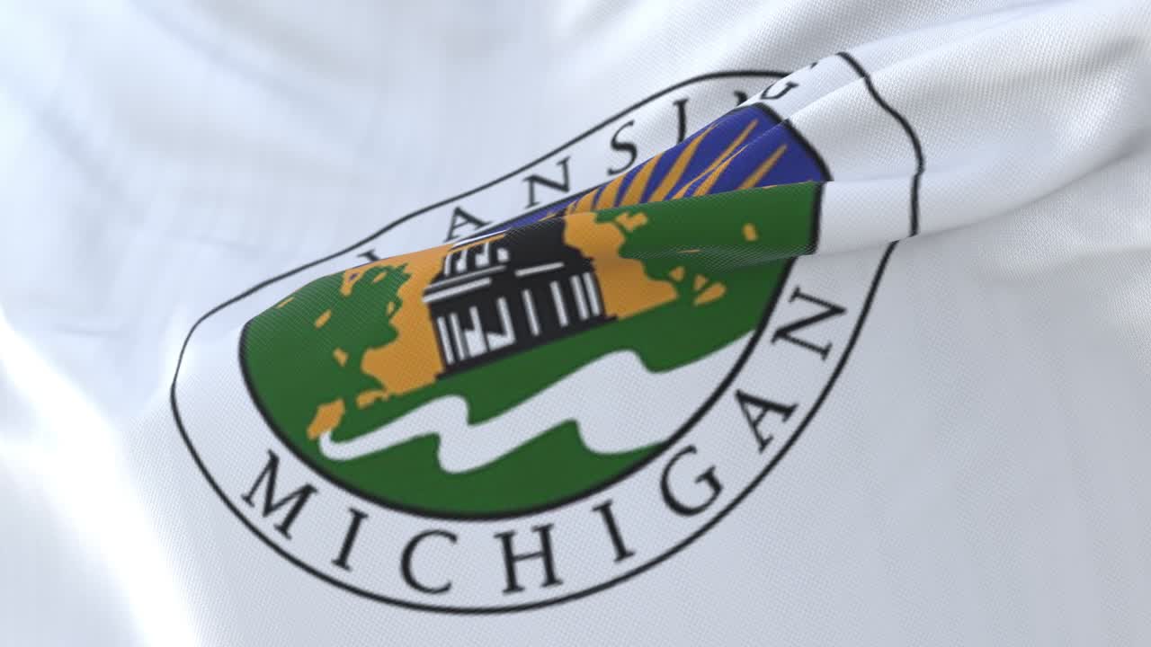 Bandiera della città di Lansing, Michigan, Stati Uniti, che sventola lentamente al vento. Loop