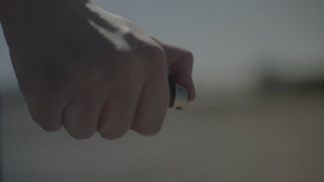 hand holding a lighter