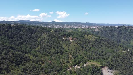 Panoramic-aerial-view-of-ravines-of-historic-city-of-Zacatlan,-Puebla,-Mexico