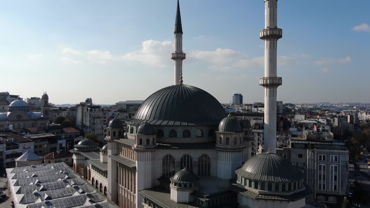 The Taksim Mosque. Taksim Square with people