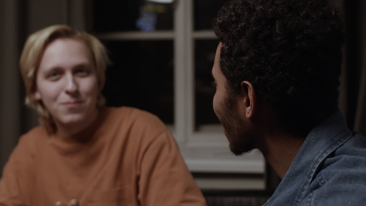 Meeting of male friends in an apartment