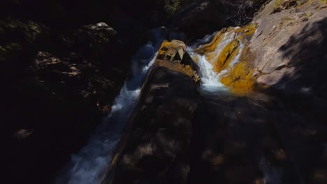 Close-up-shot-of-a-waterfall-in-a-small-mountain-river-in-the-spanish-pyrenees