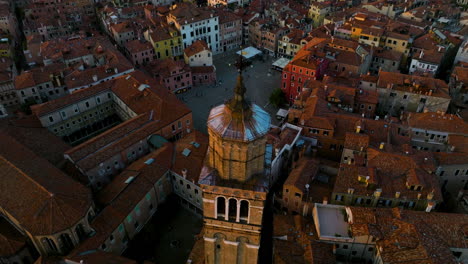 Drone-Rotating-Over-Saint-Stephen-Bell-Tower-In-Venice,-Italy