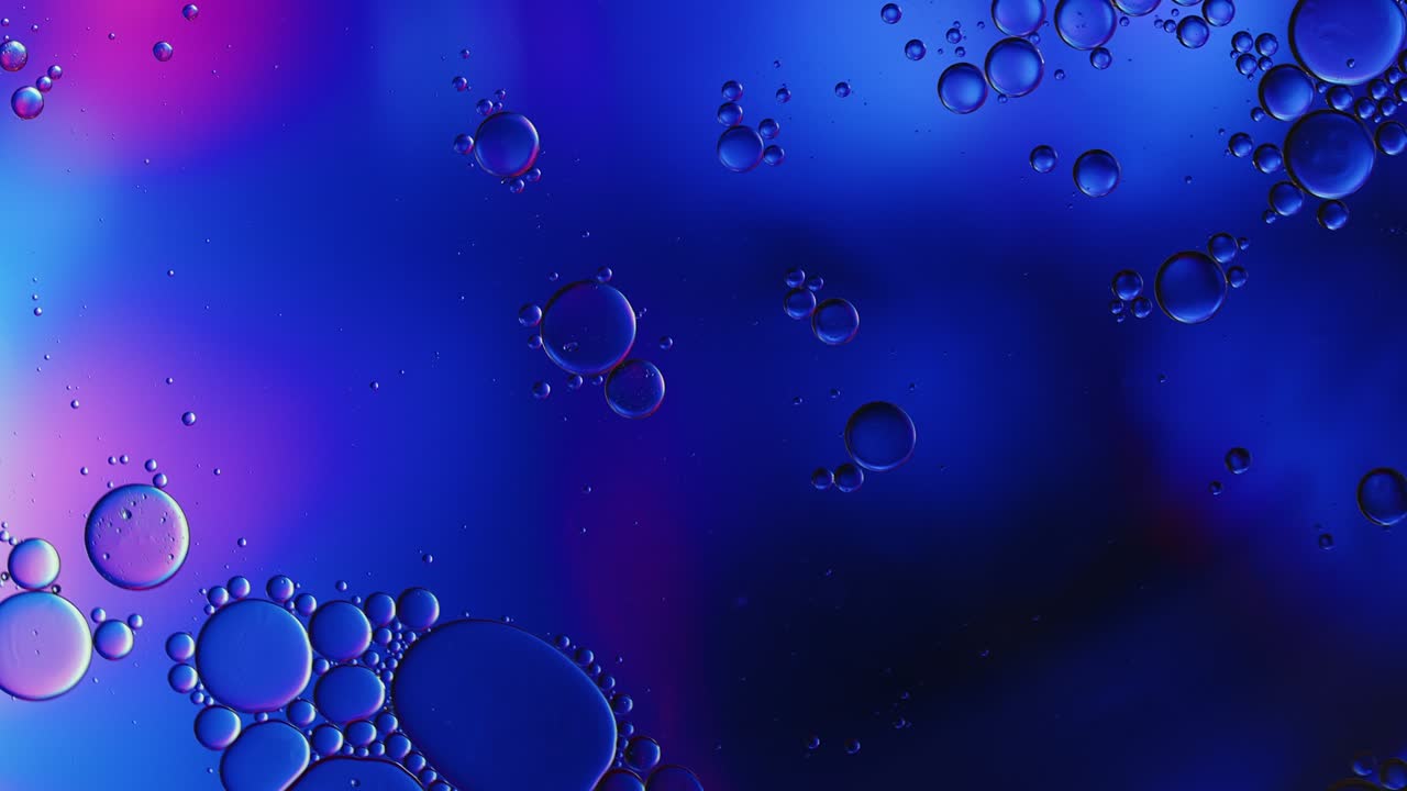 Abstract Colorful Food Oil Drops Bubbles and spheres Flowing
