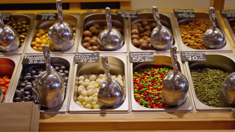 bulk nuts and candies display at a store