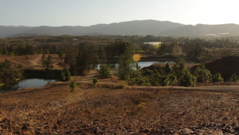 view of the andean mountains and a lake in first plan