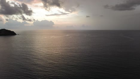 the warm color of this sea flies every one of my senses. the drone sees the golden hour this bay in sayulita, mexico that is a place for surfers and surfers makes life more magical.