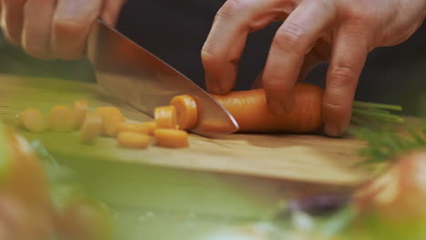 chef chopping carrots